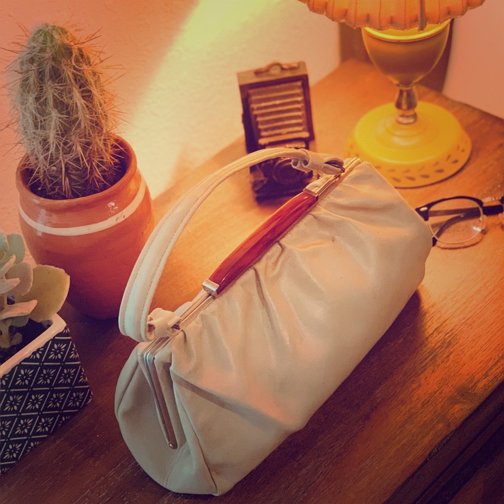 Custom 1950’s design handbag with marble lock.